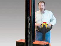 The PowerStak Straddle Design Stacker features a narrow mast with an offset design to provide workers a clear view with no blind spots.